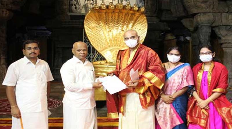 Ramakrishna Prasad hands over Rs 4.20 crore donation check announced by NRI Ravi Ika to Thirumala Srivari SVBC Trust to Additional EO