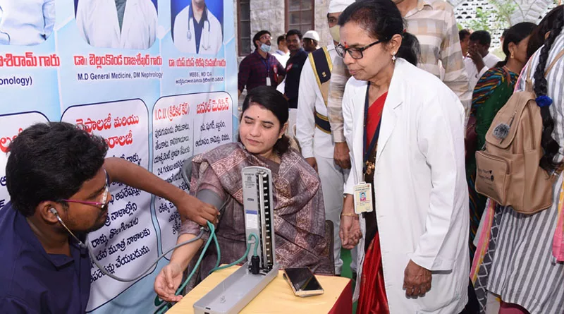 Doctors conducting medical examination of Joint Collector G. Rajakumari in the camp